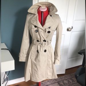 Mango trench, flannel lined. Runs small.